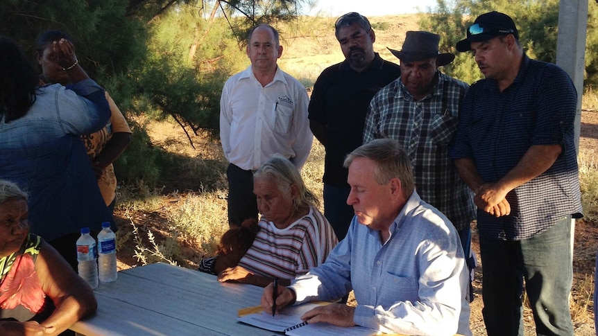 WA Premier Colin Barnett signs a native title agreement with Ngarluma traditional owners.