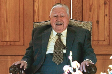 Former Chilean dictator Augusto Pinochet smiles during his 91st birthday celebrations.