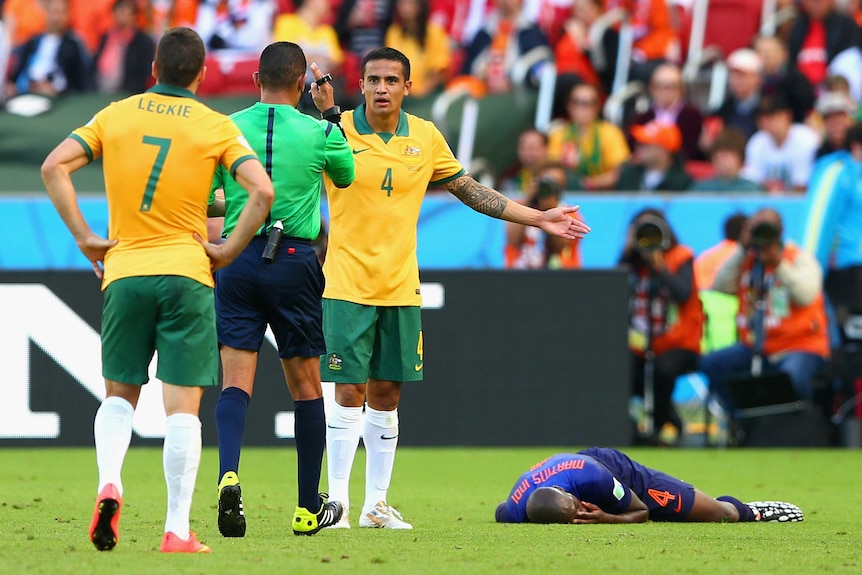 Cahill protests after fouling Martins Indi