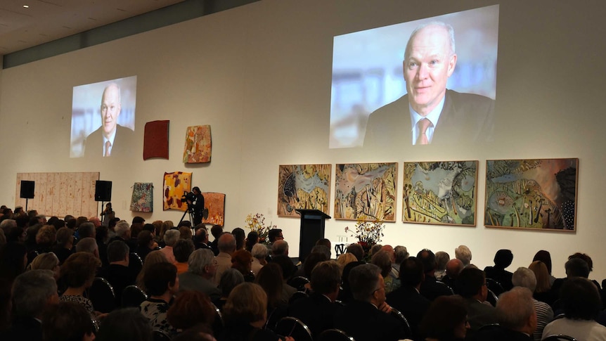 A large crowd attends Wayne Goss memorial in Brisbane.