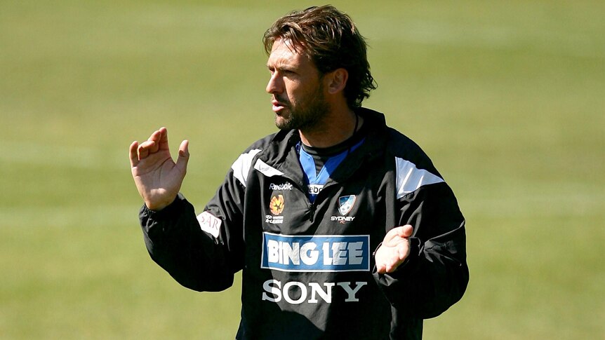 Tony Popovic looks on at training.