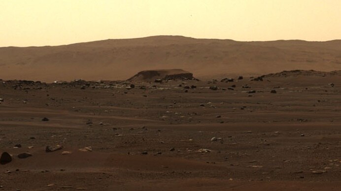 A mountain range and delta are seen on Mars
