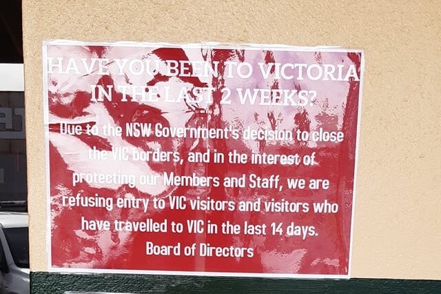A sign out the front of the Sturt Club that says it will refuse entry to all visitors who had travelled from Victoria.