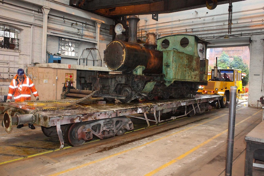 The Hunslet being placed inside for restoration.