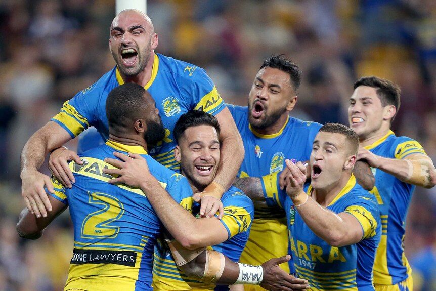 Parramatta Eels celebrate try in thrashing of Broncos