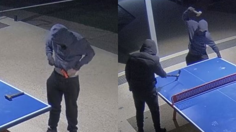 A composite image of two men wearing dark clothing, masks and hoods, vandalising a tennis table.