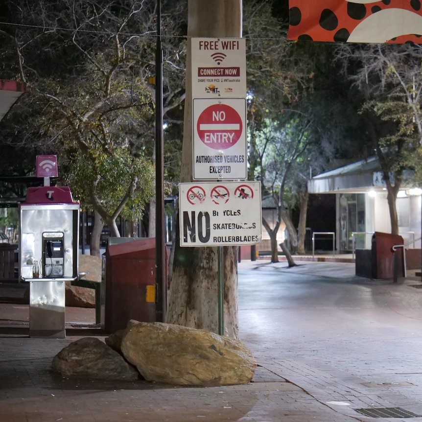 A photo of an empty street in Alice Springs.