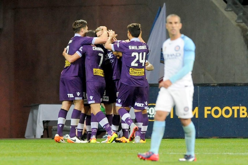 Andy Keogh of Glory celebrates with team-mates