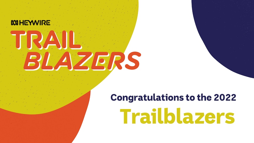 Trailblazers orange logo with Heywire positioned in the left hand corner. Text saying 'Congratulations to the 2022 Trailblazers'