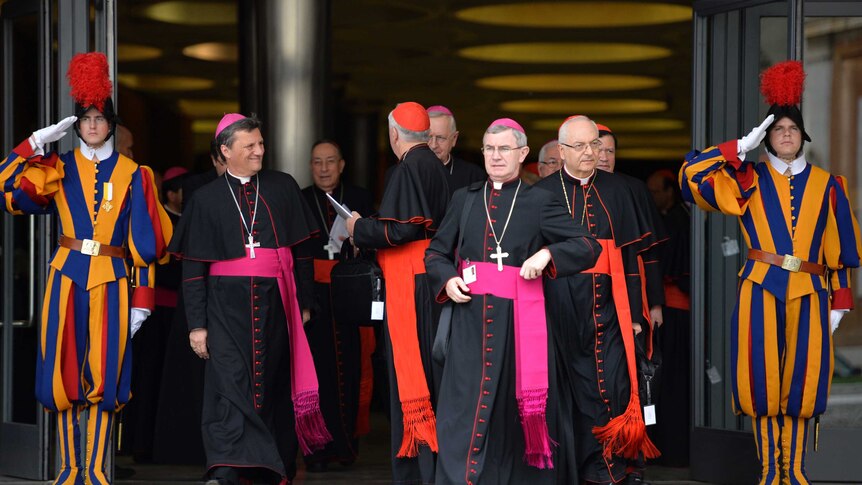Bishops and cardinals leave the Synod