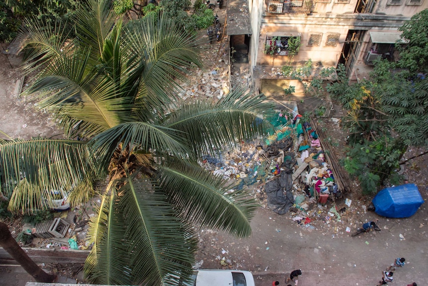 An aerial view of a large mass of rubbish on the ground