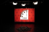 The Doomsday Clock stands in a studio.