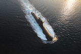 One of Australia's fleet of Collins Class submarines patrolling ocean waters.