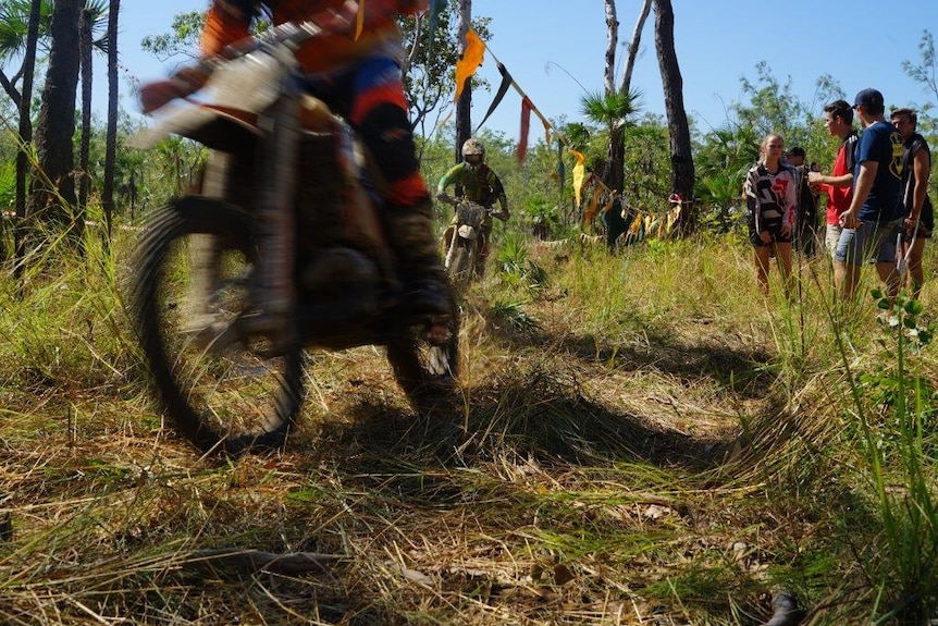 A motorbike rider on the track