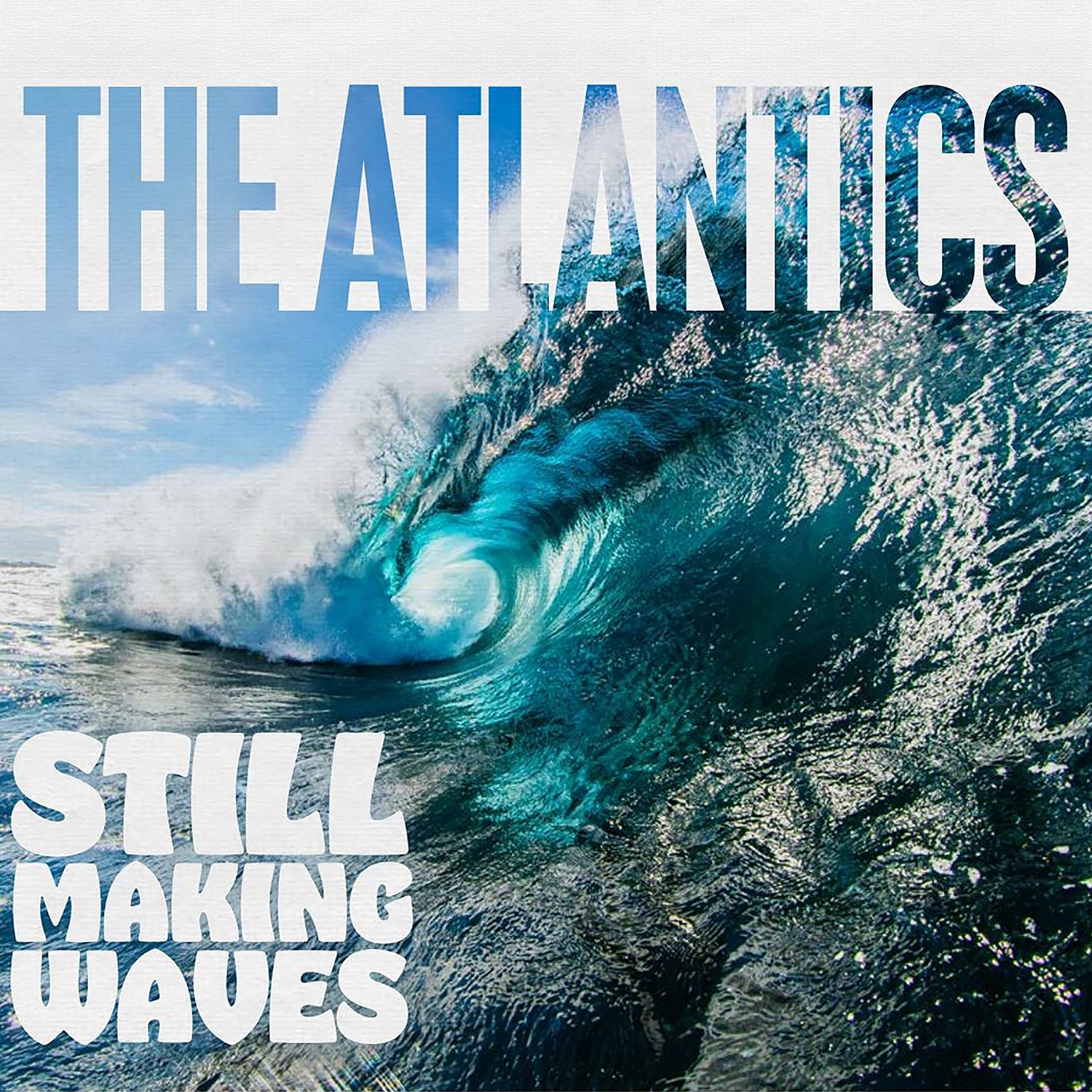 The album cover of Still Making Waves by The Atlantics, featuring a photo of the barrel of a wave breaking