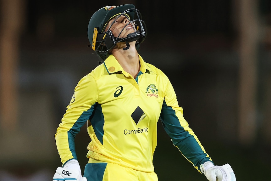 Ash Gardner looks up to the sky after being dismissed in an ODI between Australia and South Africa.