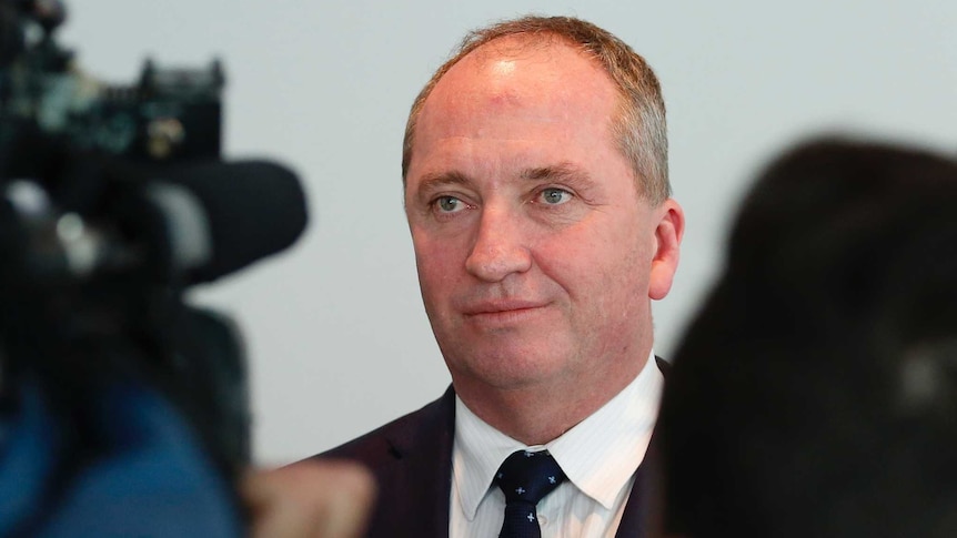 Barnaby Joyce wears a neutral expression with his mouth softly closed.