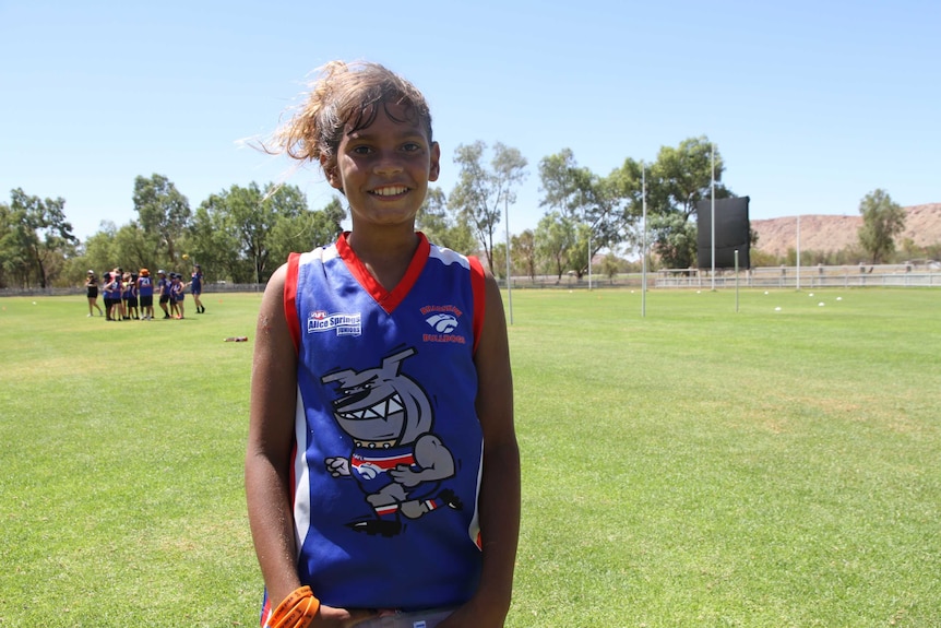 Tilly Doolan on a football field.