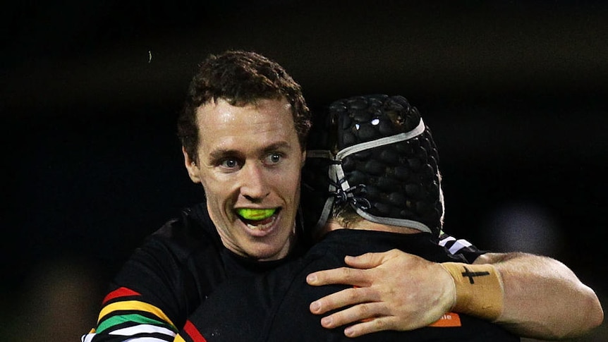David Simmons (C) chalked up a hat-trick as Penrith put the Raiders to the sword.