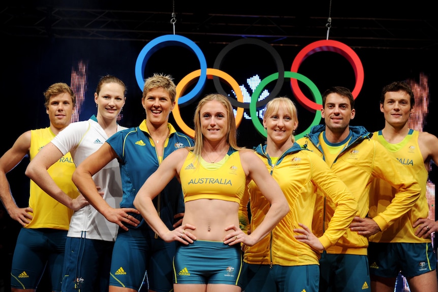 Australian athletes model the team uniform for the London Olympics. (AAP: Tracey Nearmy)