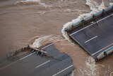 Top End highway and rail links broken by floodwaters