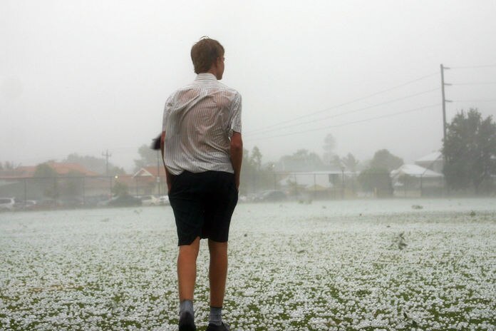Hail blankets a playing field at Perth's Wesley College