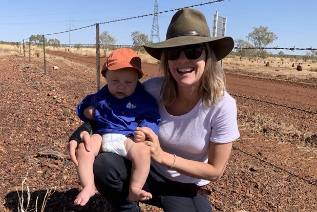 Kristy O'Brien with her son Hudson on her knee