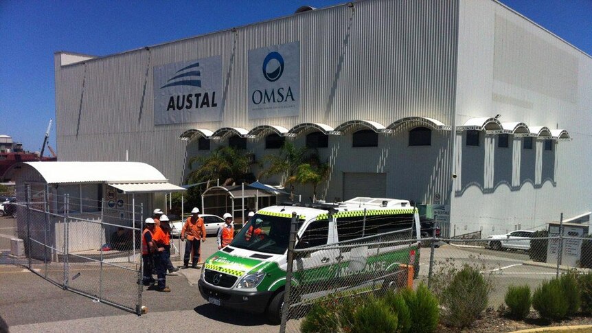 An ambulance leaves Austal Engineering
