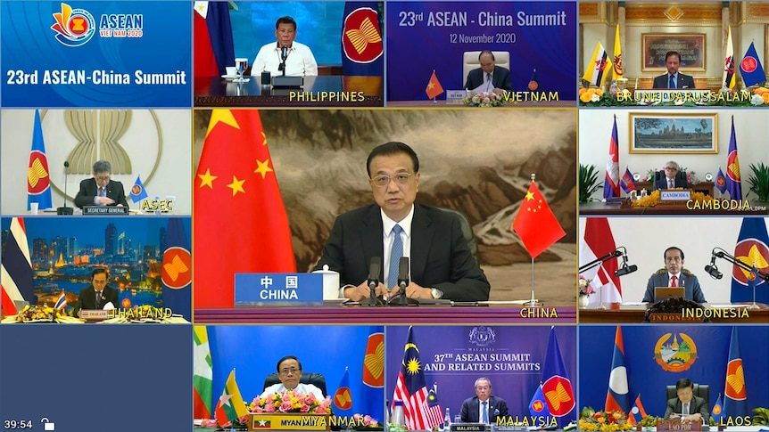 A screen shows Chinese Premier Li Keqiang, centre, speaking during a virtual summit with ASEAN leaders