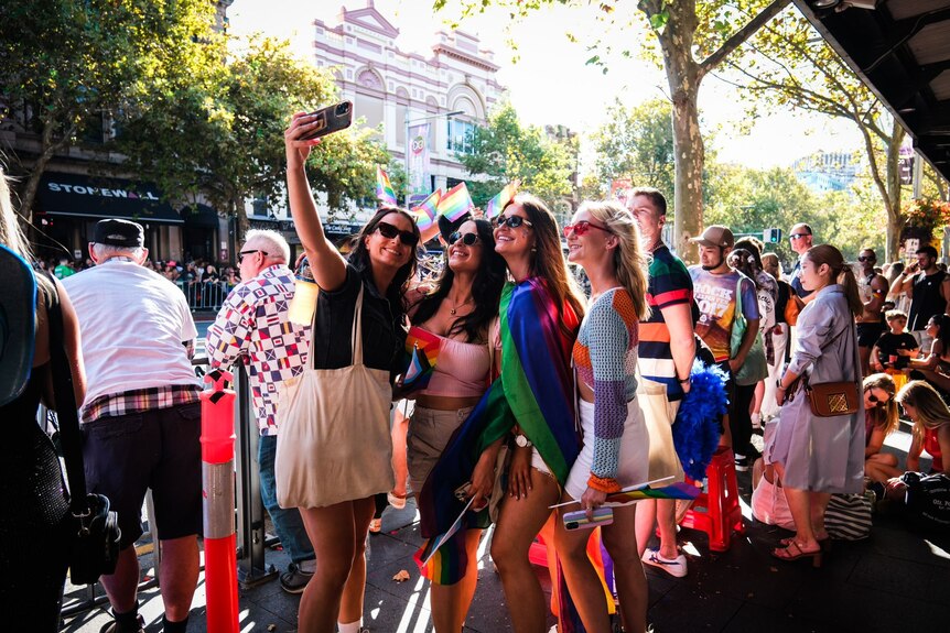 a group of young women taking a selfie