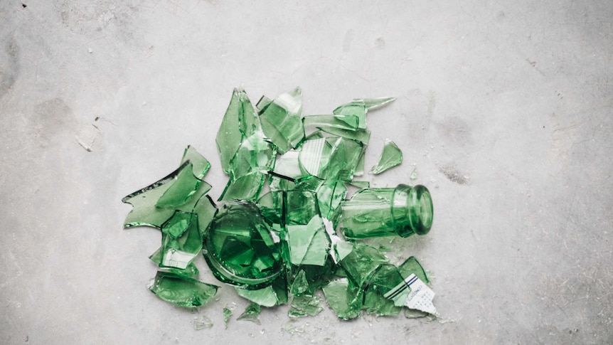 green broken glass bottle