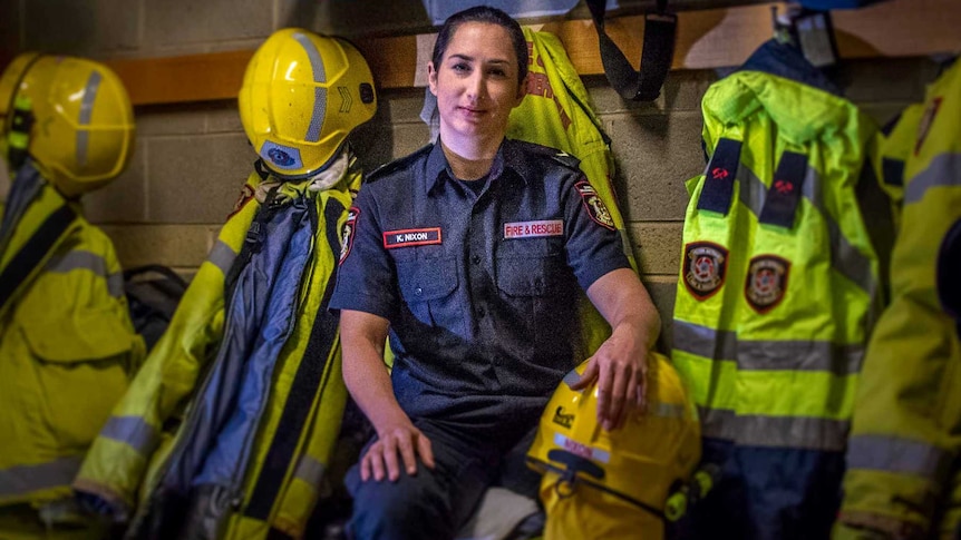 Female firefighter in station