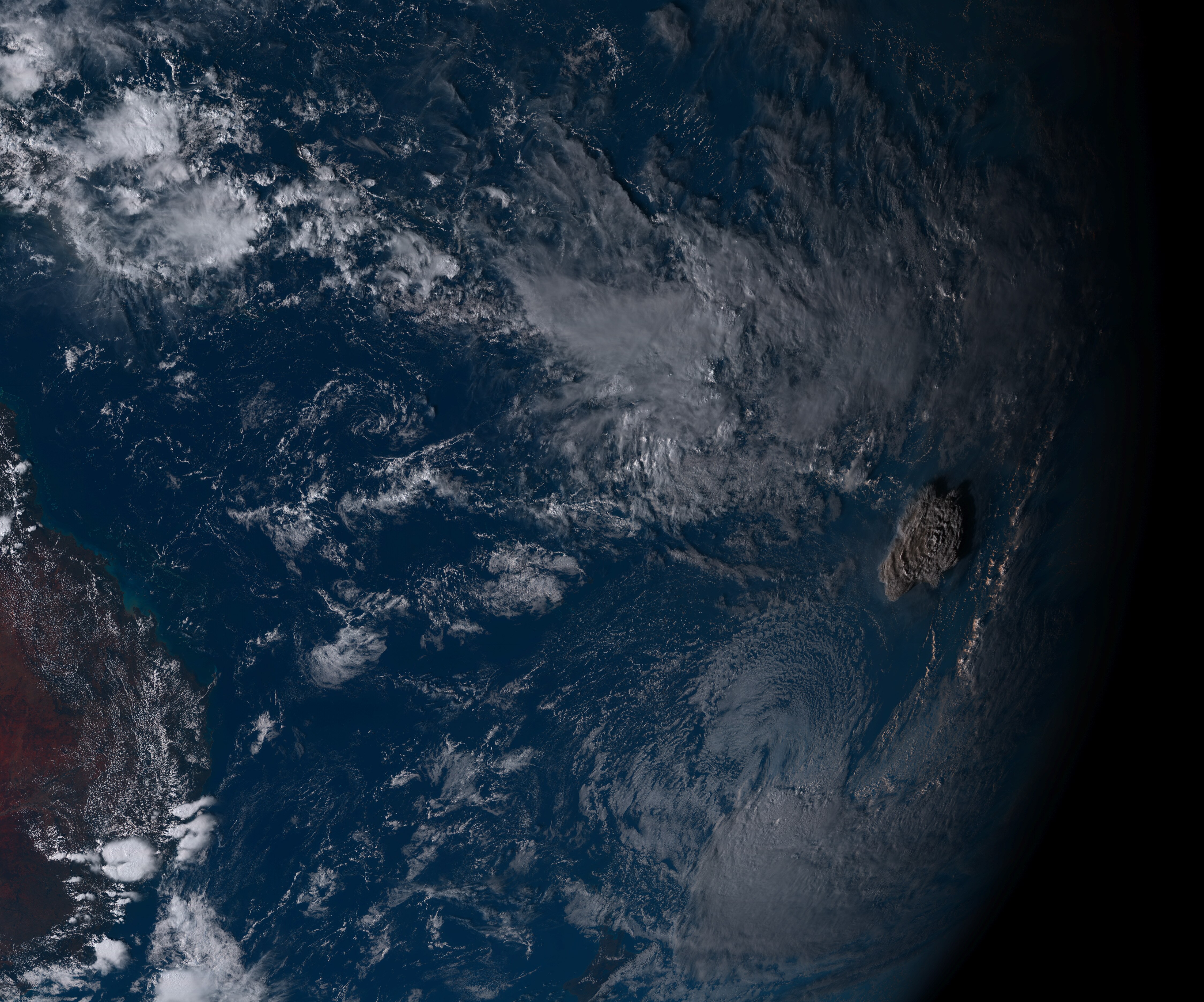 The ash cloud from the Tongan volcano has again grown bigger in this satellite image.