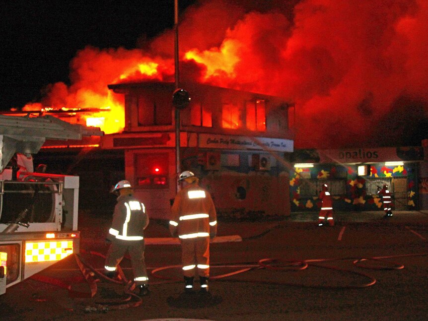 Fire crews tackle a blaze in a commercial complex at outback Coober Pedy.