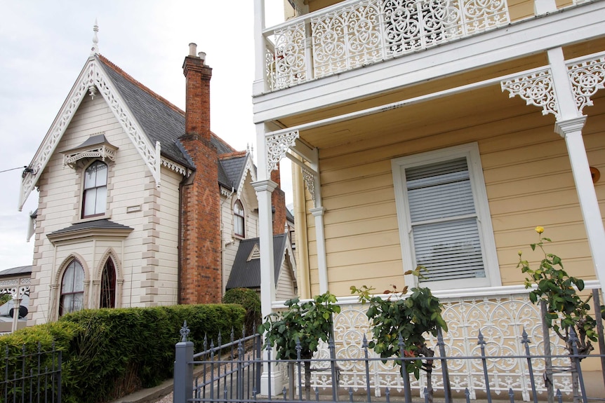 Two ornately decorated historic houses in Launceston, one free standing and one townhouse.