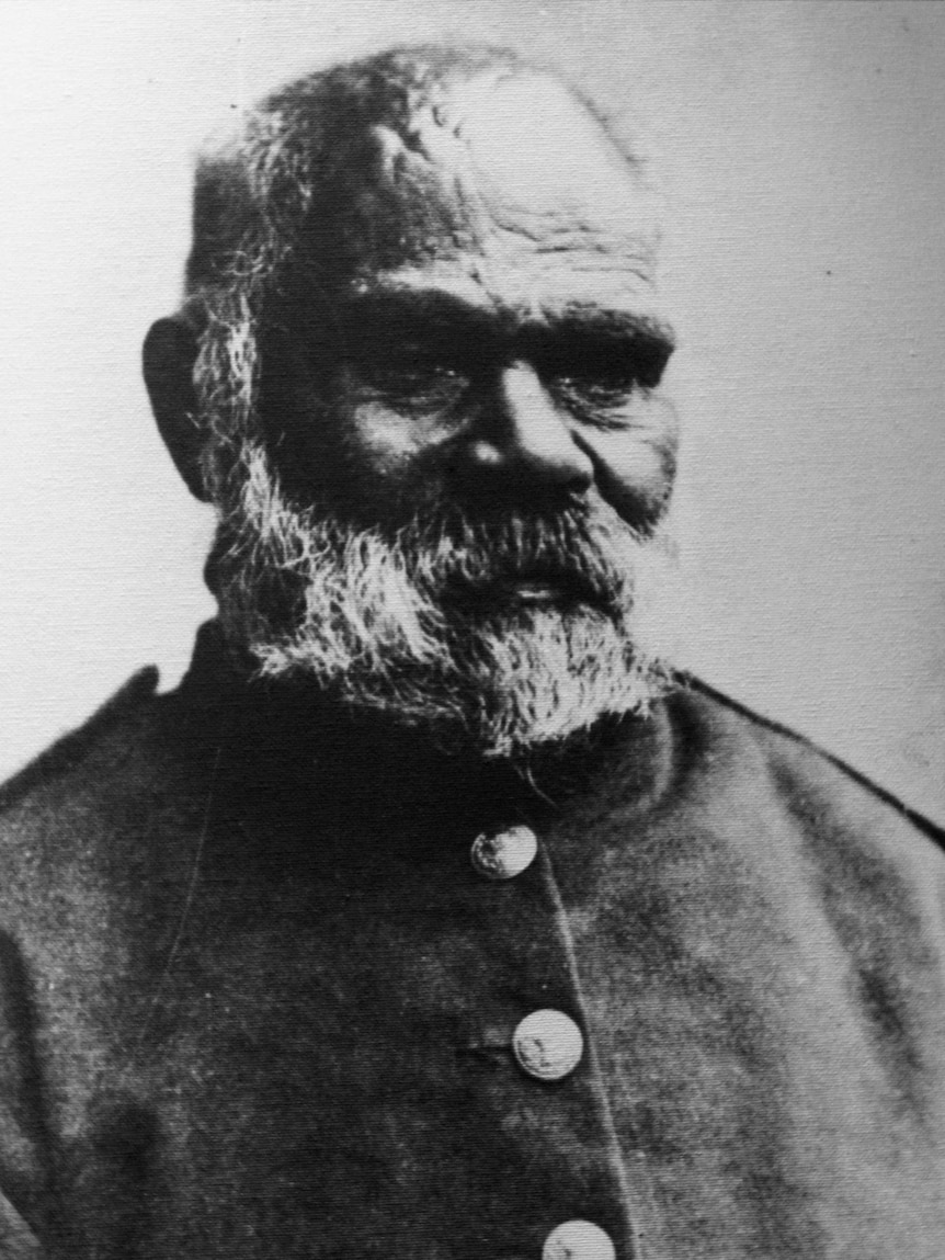 Historic image of Aboriginal man wearing uniform