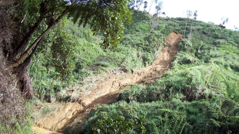 At least 10 people were killed after heavy rain caused a hilltop above the site to give way.