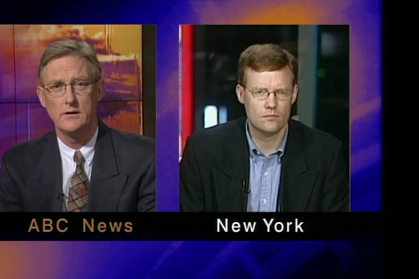 Screen shot of man in ABC studio interviewing reporter in New York.