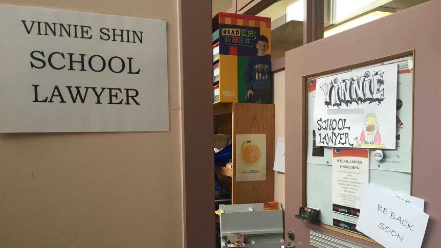 An open door with a sign which reads "Vinnie School Lawyer"