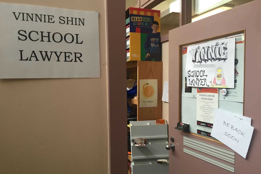 An open door with a sign which reads "Vinnie School Lawyer"