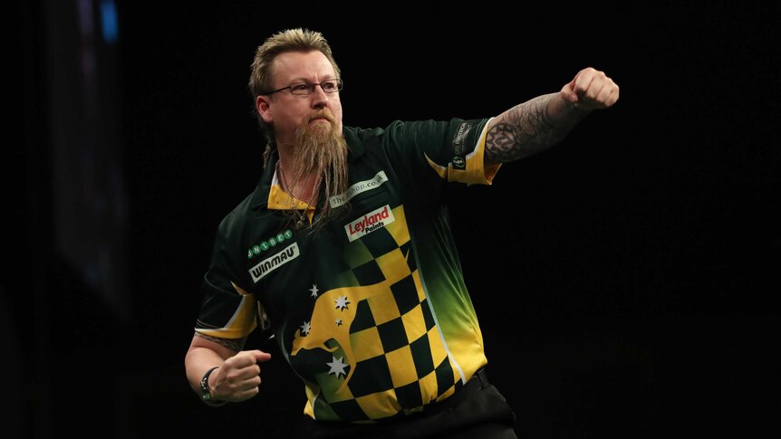 Simon Whitlock punches the air