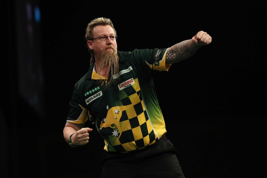 Simon Whitlock punches the air