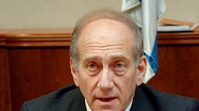 Business as usual: Mr Olmert says Mr Sharon would want work to continue.