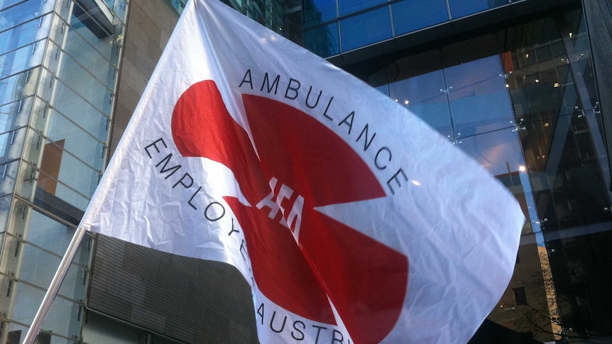 Paramedics rally over long-running pay dispute