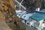 yacht smashed on rocks Tas