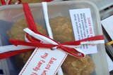 A note on a box of homemade Anzac biscuits sent to Baked Relief