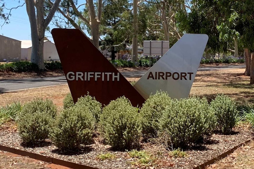 Sign with text "Griffith airport"