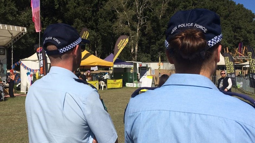Two police officers at an event .