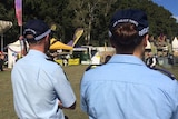 Two police officers at an event .