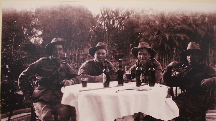 Third light horse troopers enjoying a beer in Cairo, 1915.
